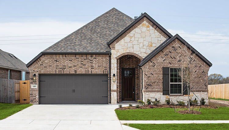 Custom home with residential tile-style roof