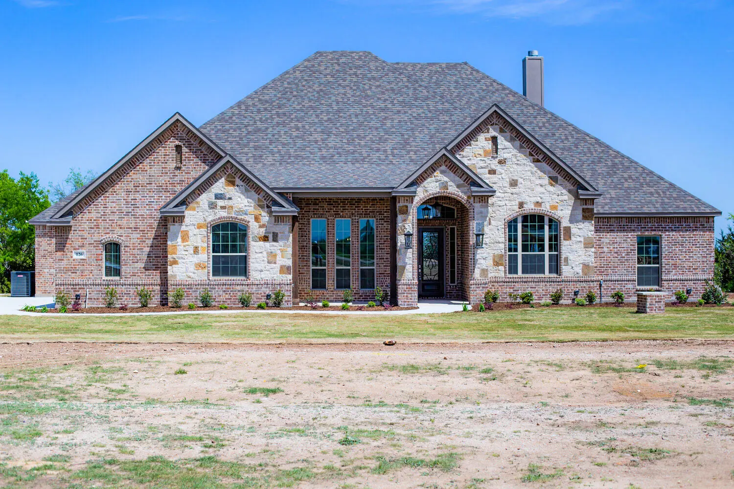 Custom home with tile roof profile