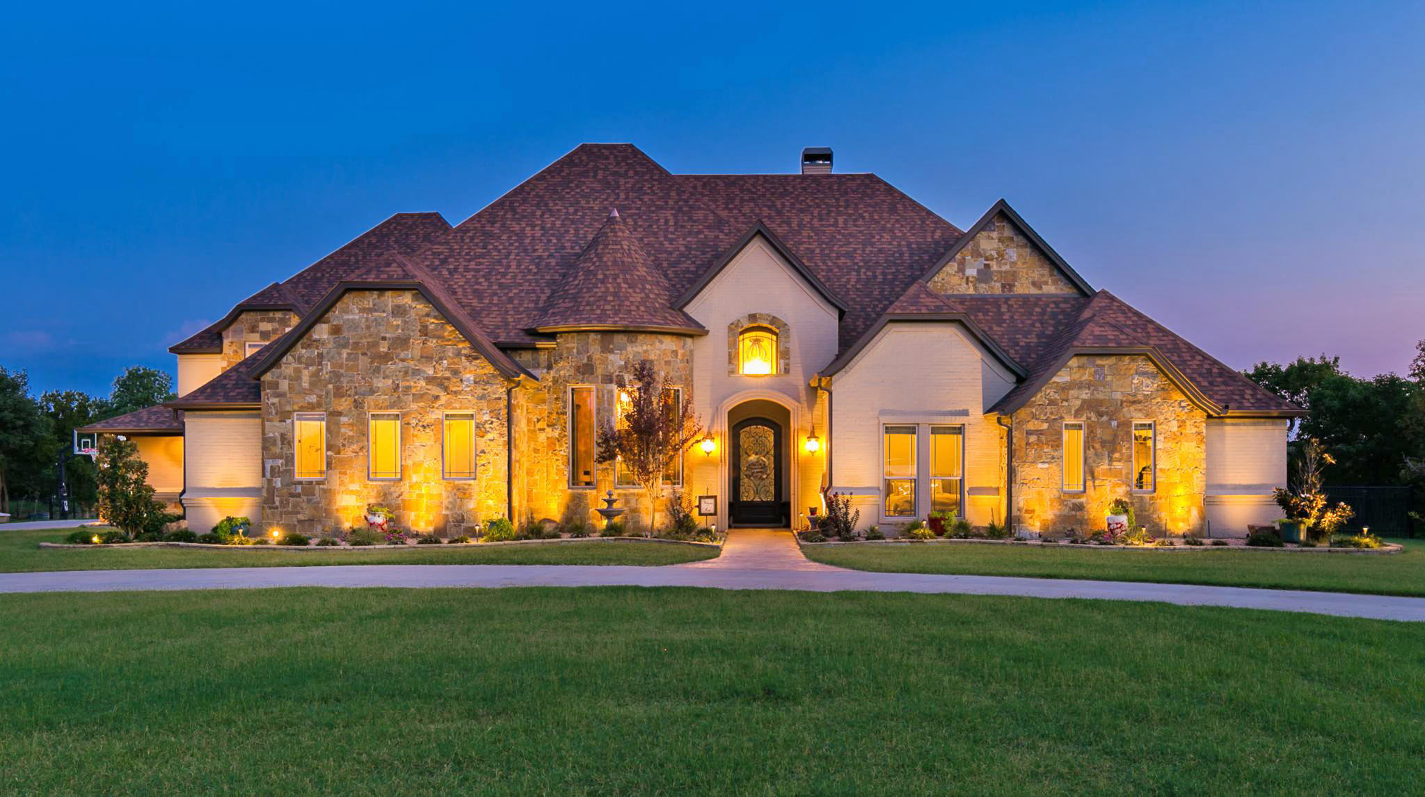 Custom home elevation with shingle roof, MK project