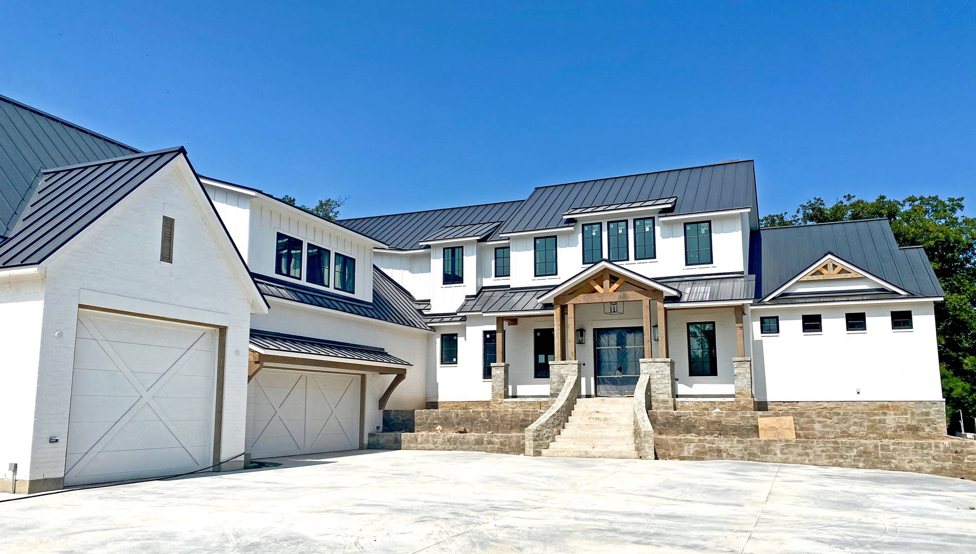 Residential home with a completed shingle roof